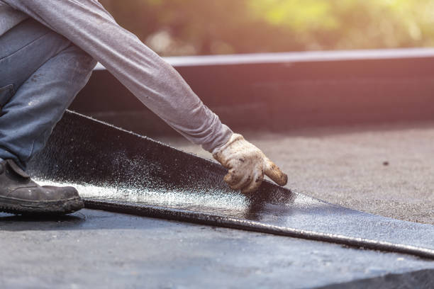 Professional Basement Waterproofing technician working in Thorn Hill, TN